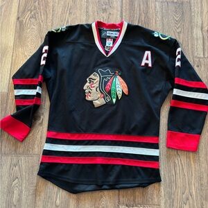 Blackhawks Duncan Keith Authentic Reebok Black and Red Hockey Jersey